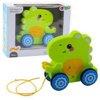 LEAN Toys Dinozaur Na Sznurku Jeżdżący Do Ciągnięcia Dla Malucha Grzechotka Zielony