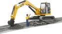 Minikoparka CAT z figurka robotnika BRUDER